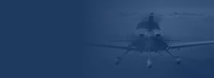 Propeller plane flies through the sky